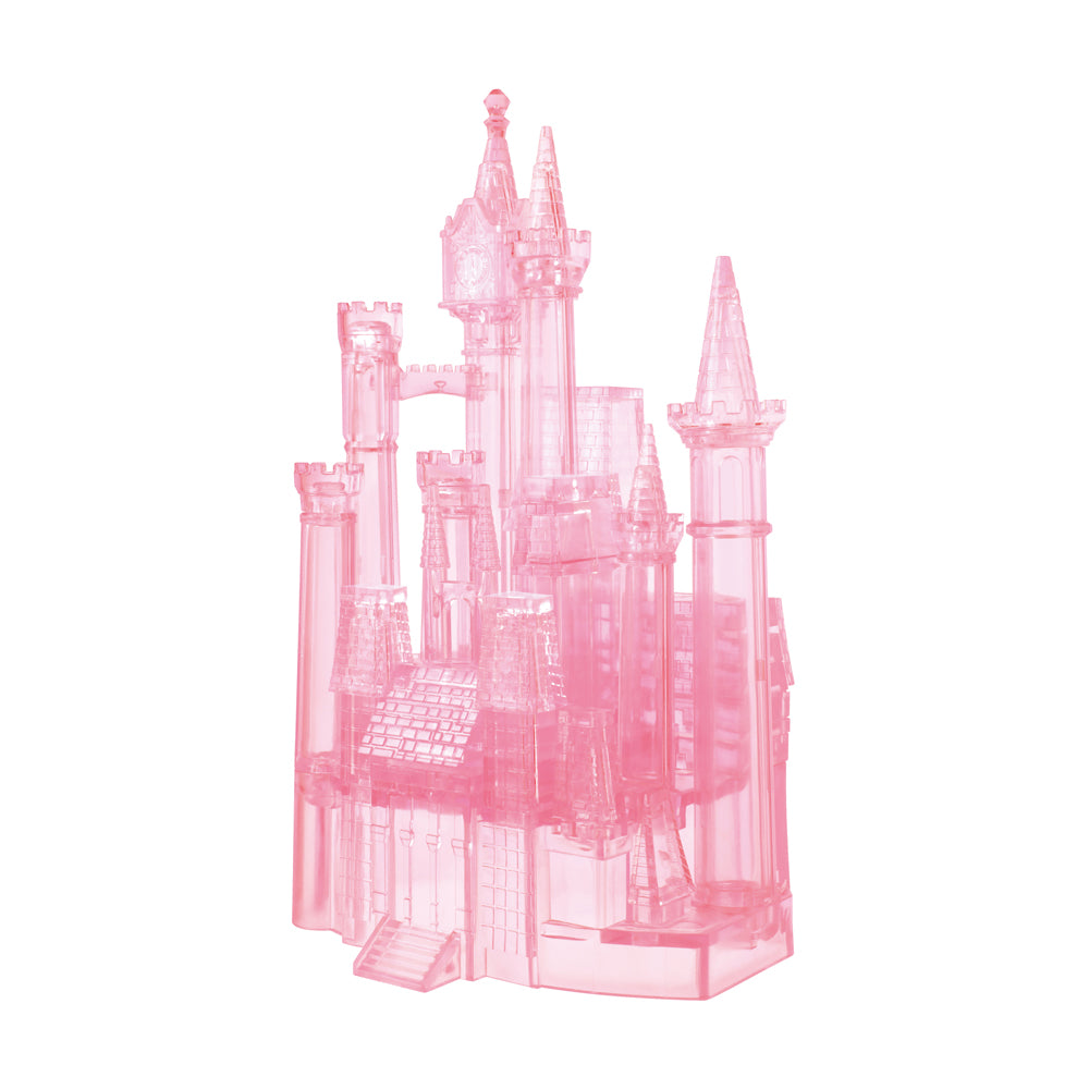Pink translucent 3D crystal puzzle castle with multiple towers, spires, and architectural details on plain white background