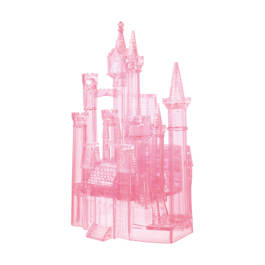 Pink translucent 3D crystal puzzle castle with multiple towers, spires, and architectural details on plain white background
