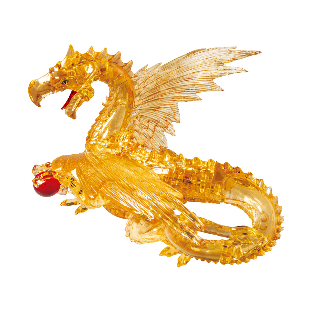 Golden translucent dragon figure with spiked head, wings, and tail, assembled from crystal puzzle pieces