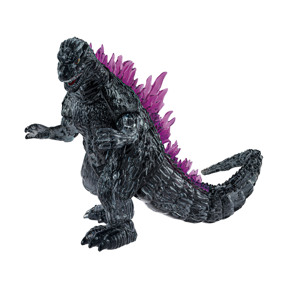 Black Godzilla action figure with purple dorsal fins and articulated limbs on plain background