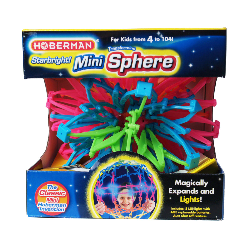 Hoberman Mini Sphere Starbright with colorful interlocking struts in pink, blue, and green, shown expanded with LED lights illuminated inside, displayed in pack