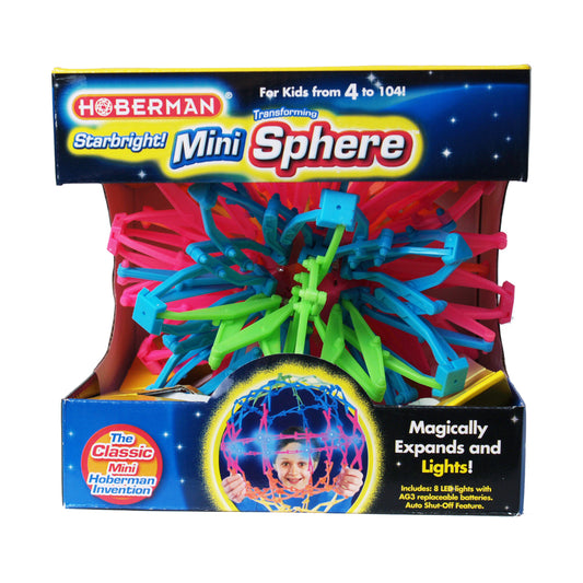 Hoberman Mini Sphere Starbright with colorful interlocking struts in pink, blue, and green, shown expanded with LED lights illuminated inside, displayed in pack