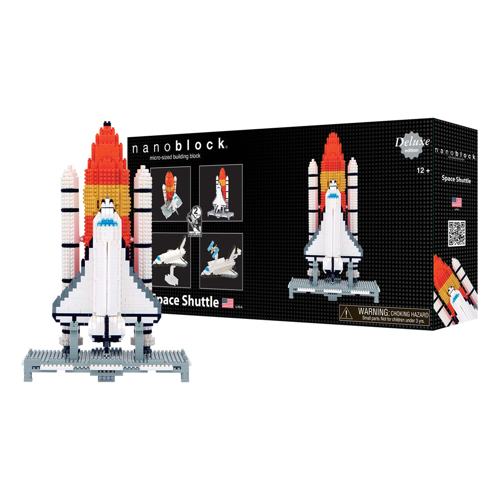 Nanoblock Space Shuttle Deluxe Edition micro-sized building block set with assembled white and red shuttle model and launch base displayed next to black box pac