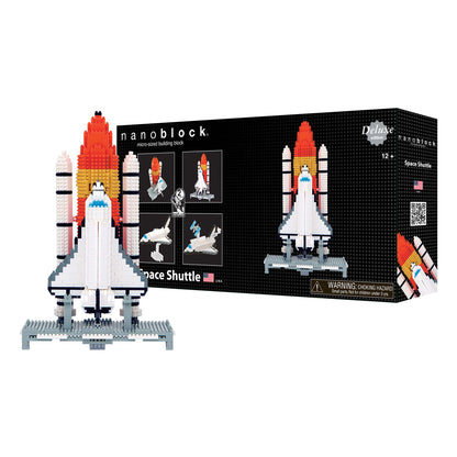 Nanoblock Space Shuttle Deluxe Edition micro-sized building block set with assembled white and red shuttle model and launch base displayed next to black box pac