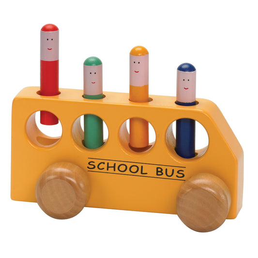 Yellow wooden school bus toy with four colorful pop-up peg figures with smiling faces in red, green, orange, and blue