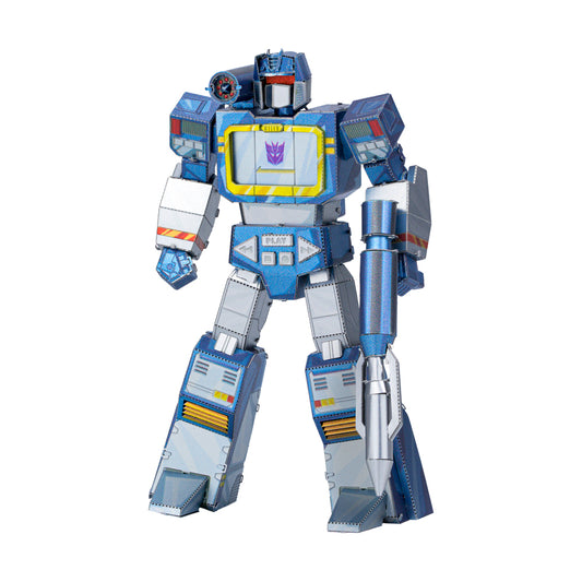 Blue and gray Transformers Soundwave action figure with articulated limbs, yellow-accented chest panel, and silver cannon arm on plain background