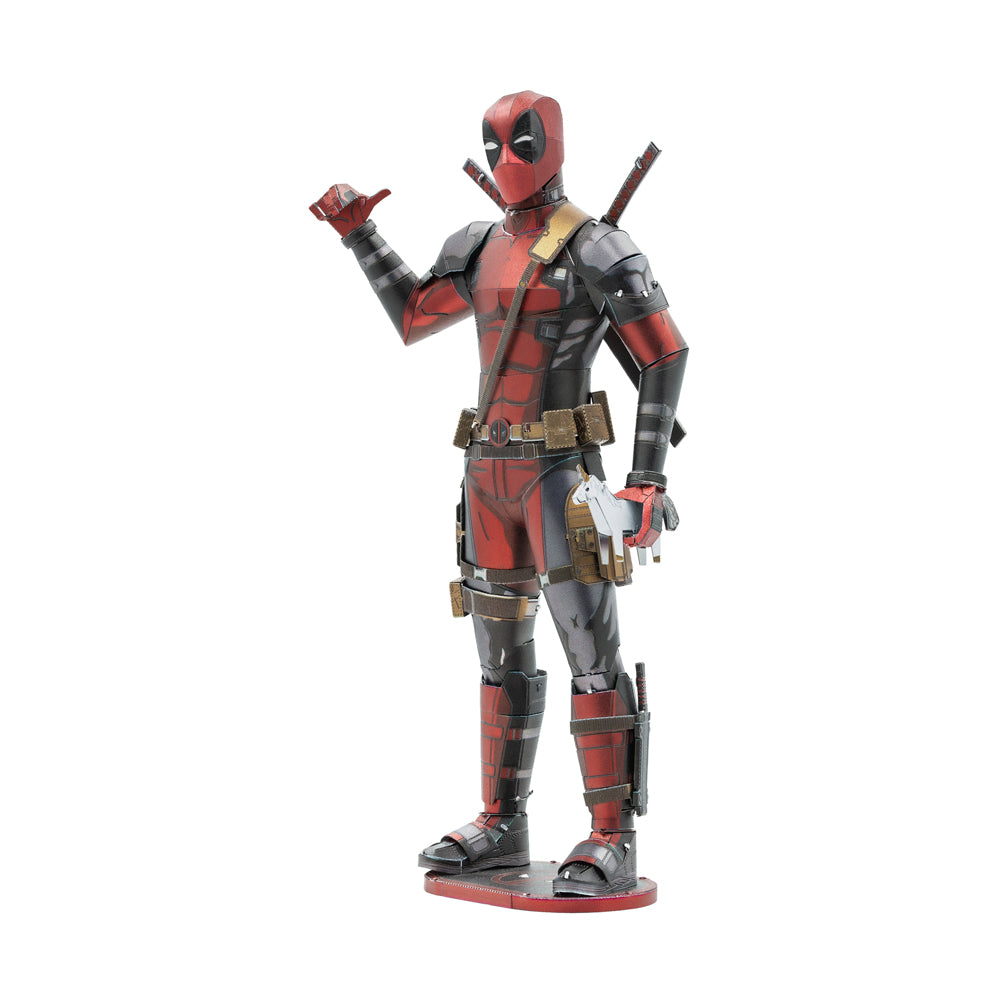 Deadpool action figure in red and black costume with dual swords, posed on a red base against plain background