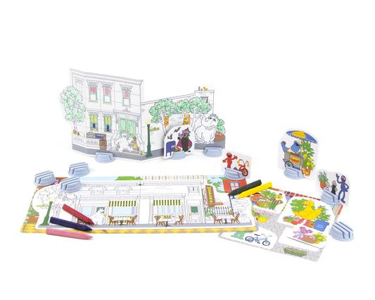 Sesame Street Neighborhood Maker 3D coloring activity set with pop-up building structures, coloring pages, character cutouts, markers, and craft pieces on white