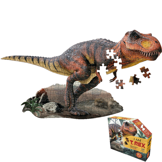 T-Rex shaped jigsaw puzzle with orange and brown coloring, shown assembled on a rocky base with some pieces displayed separately, and the product box below