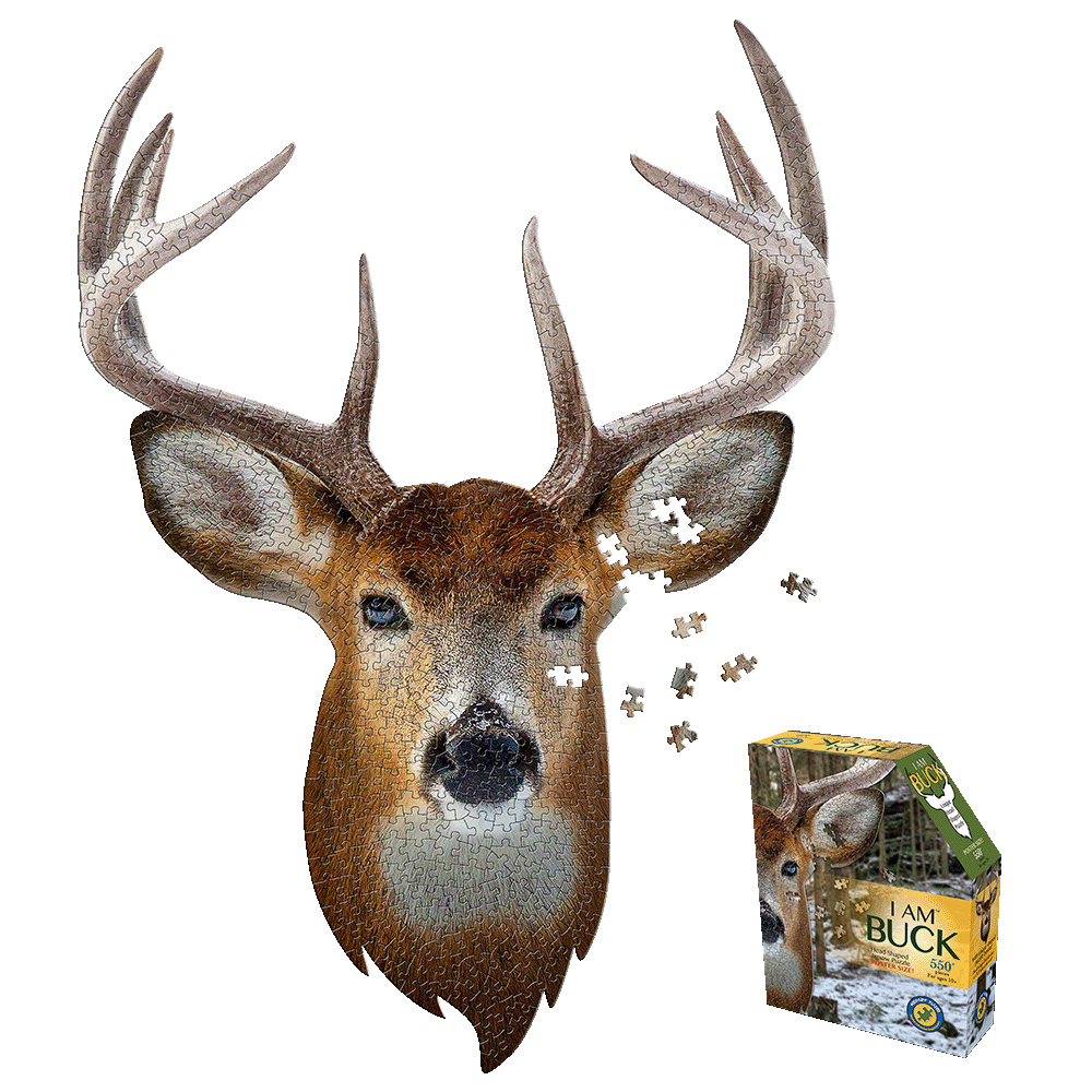 I AM BUCK jigsaw puzzle showing deer head-shaped puzzle with brown fur, large antlers, and scattered puzzle pieces, next to yellow and green product box