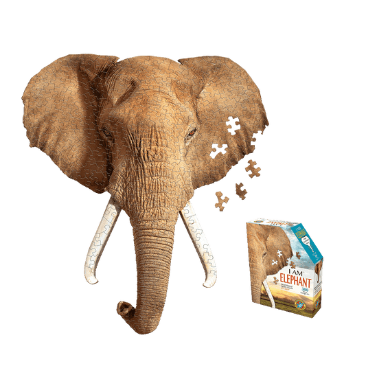 I AM ELEPHANT 300-piece jigsaw puzzle showing brown elephant head with tusks and scattered puzzle pieces, next to product box
