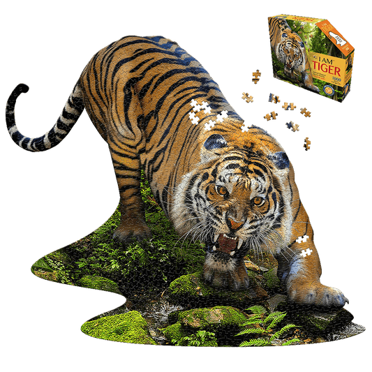 Madd Capp I AM Tiger 1000-piece jigsaw puzzle showing assembled puzzle of tiger in jungle landscape with puzzle box and loose pieces displayed