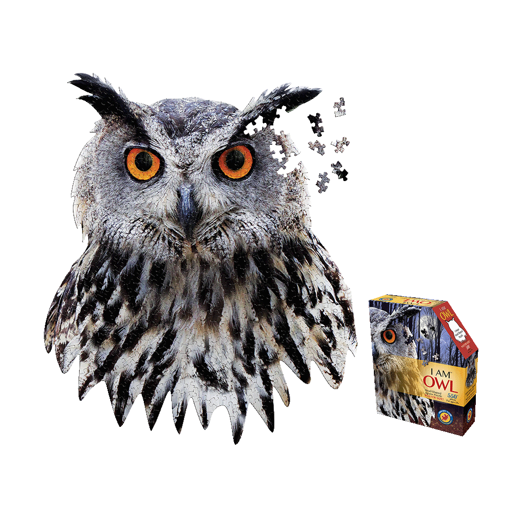 Gray owl with bright orange eyes and black feather markings, puzzle pieces floating from its head; I AM OWL 550-piece jigsaw puzzle box shown at right