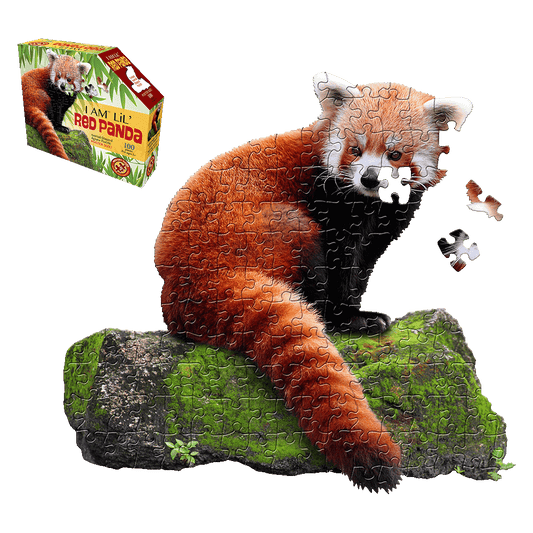 I AM LiL' Red Panda 100-piece shaped jigsaw puzzle showing a red panda sitting on a moss-covered log, with loose puzzle pieces displayed
