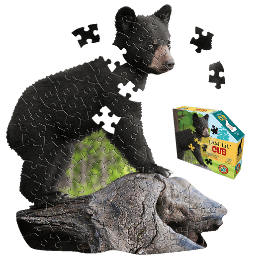 I AM Lil' Cub 100-piece jigsaw puzzle showing black bear cub stacked on mother bear, with loose puzzle pieces and product box displayed