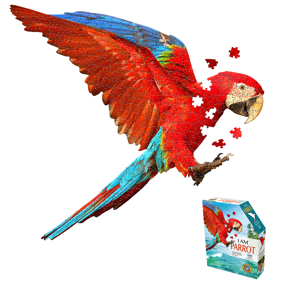 Red and blue parrot-shaped jigsaw puzzle with loose pieces scattered, shown next to product box labeled 'I AM Parrot 300 pieces'