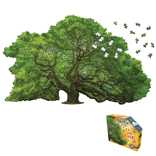 Madd Capp I AM OAK Tree-Shaped Jigsaw Puzzle with 1000 pieces shown assembled as a full green oak tree with scattered puzzle pieces floating away, and product b