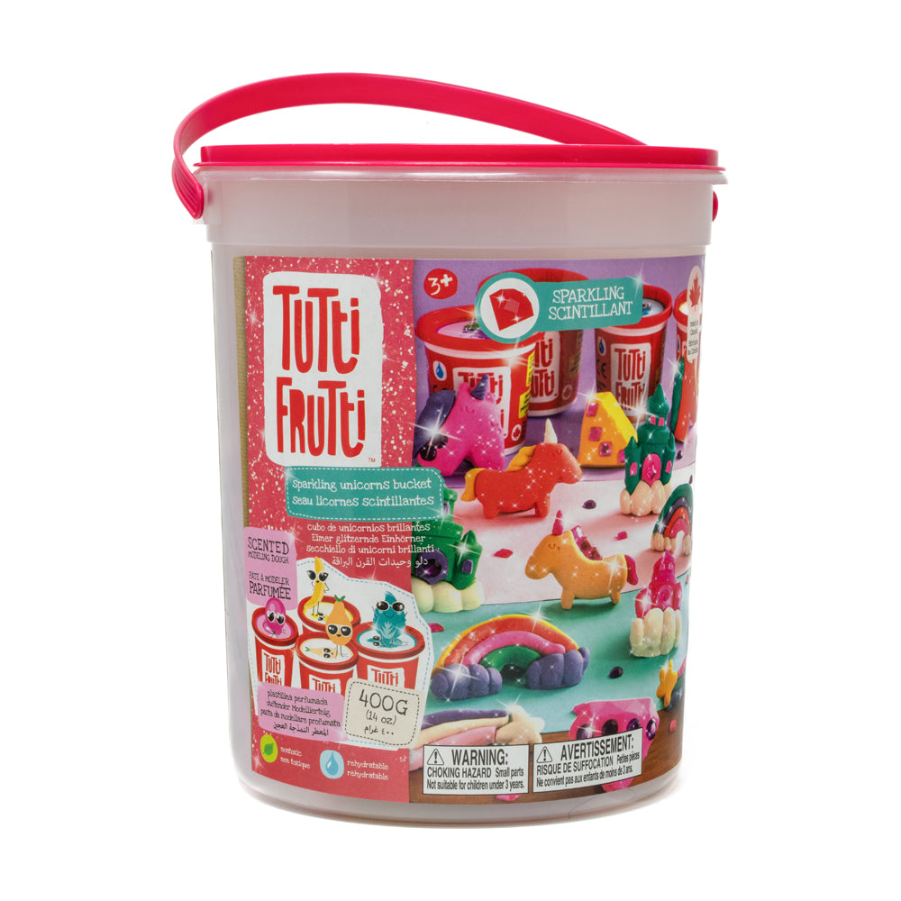 Tutti Frutti Sparkling Unicorns scented modeling dough bucket with red lid and handle, showing colorful sparkling dough unicorns and accessories inside