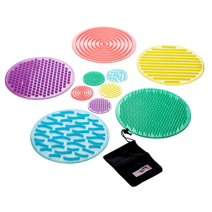 TickiT SiliShapes Sensory Circles set with 10 colorful textured discs in purple, pink, yellow, blue, teal, and smaller sizes, plus black storage pouch