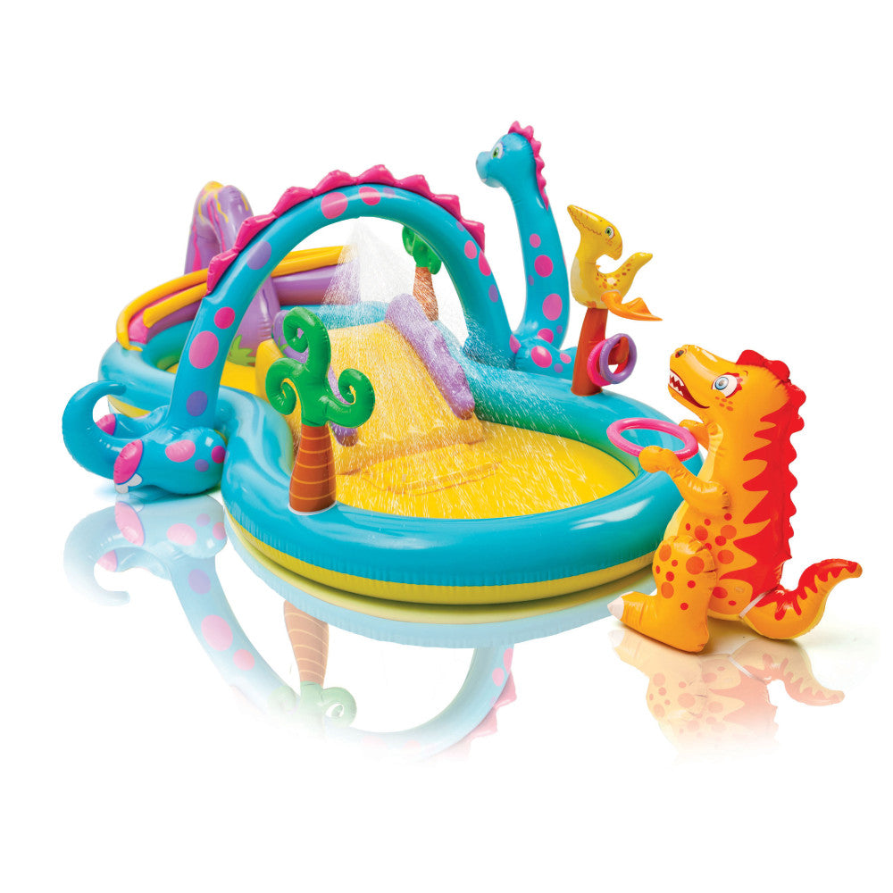 Colorful inflatable dinosaur-themed play center and pool with turquoise base, pink-spotted dino neck arches, yellow water slide, and orange dinosaur figures on