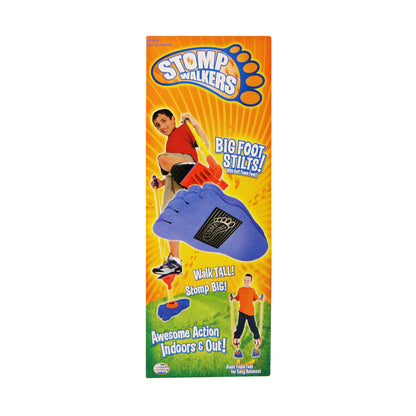 Stomp Walkers product packaging showing child on model wearing red shirt using blue foam foot stilts for balance activity, with product name and "Big Foot Stilt