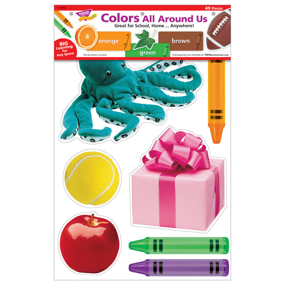 TREND Colors All Around Us 49-piece learning set showing colorful cutout items including turquoise octopus with wheels, yellow tennis ball, red apple, pink gift