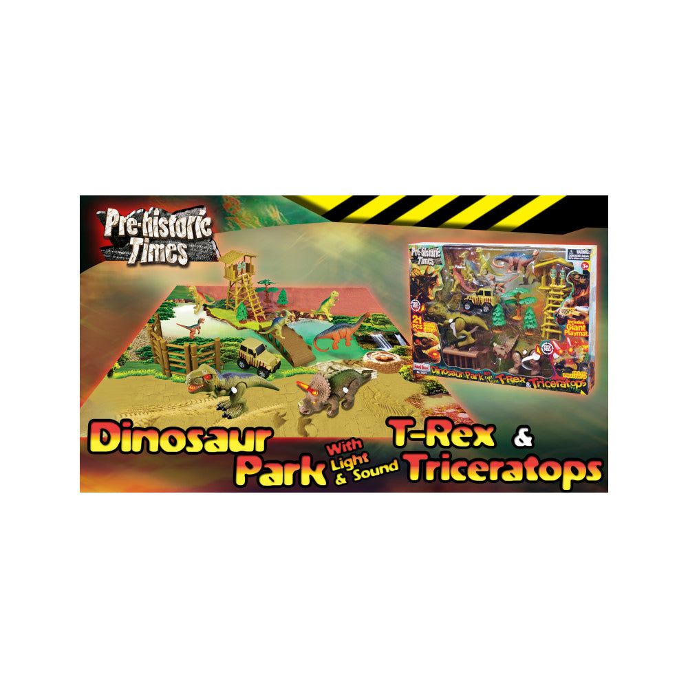 Prehistoric Times Dinosaur Park playset with light and sound featuring T-Rex and Triceratops dinosaur figures, trees, fencing, and structures on sandy terrain