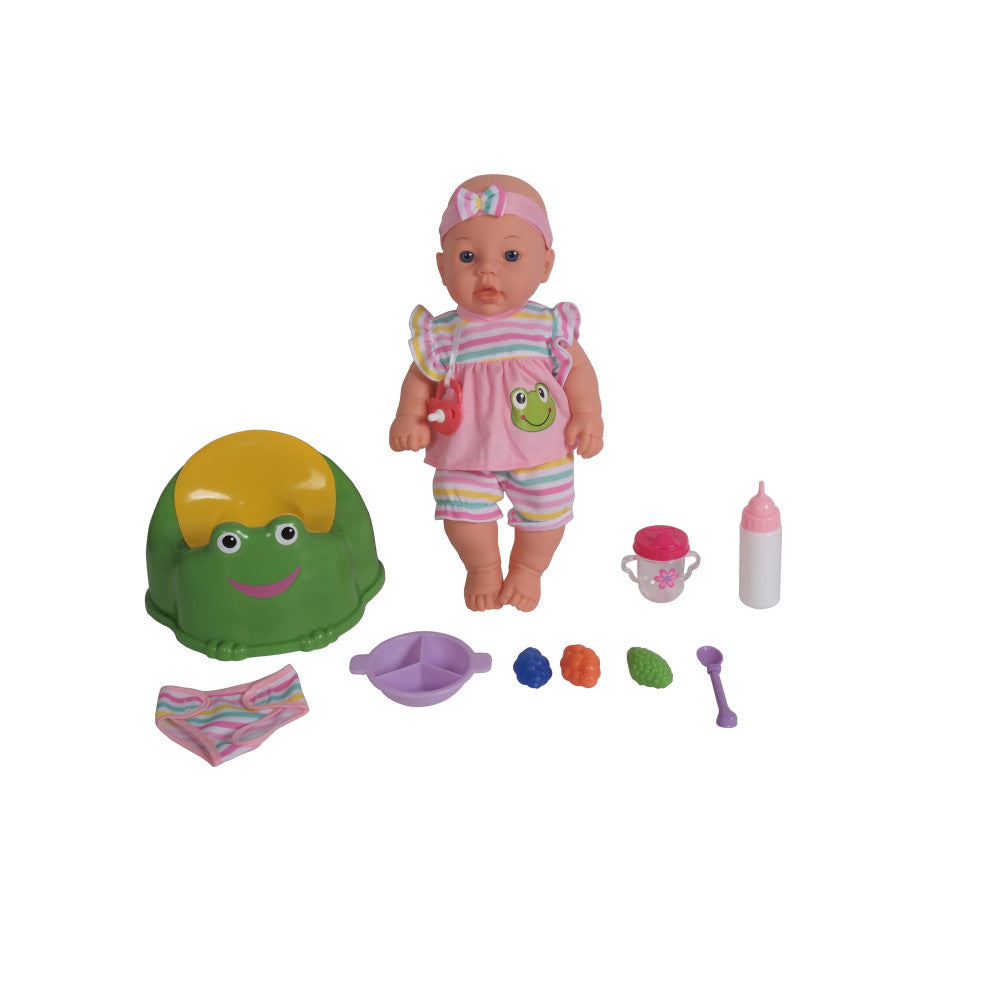 Baby doll wearing pink striped outfit with headband, displayed with accessories including green frog potty seat, colorful play food, bottle, diaper, and purple