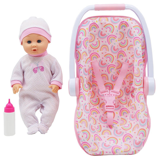 Baby doll with white hat and lavender outfit, accompanied by a pink and white carrier with rainbow pattern and a toy bottle