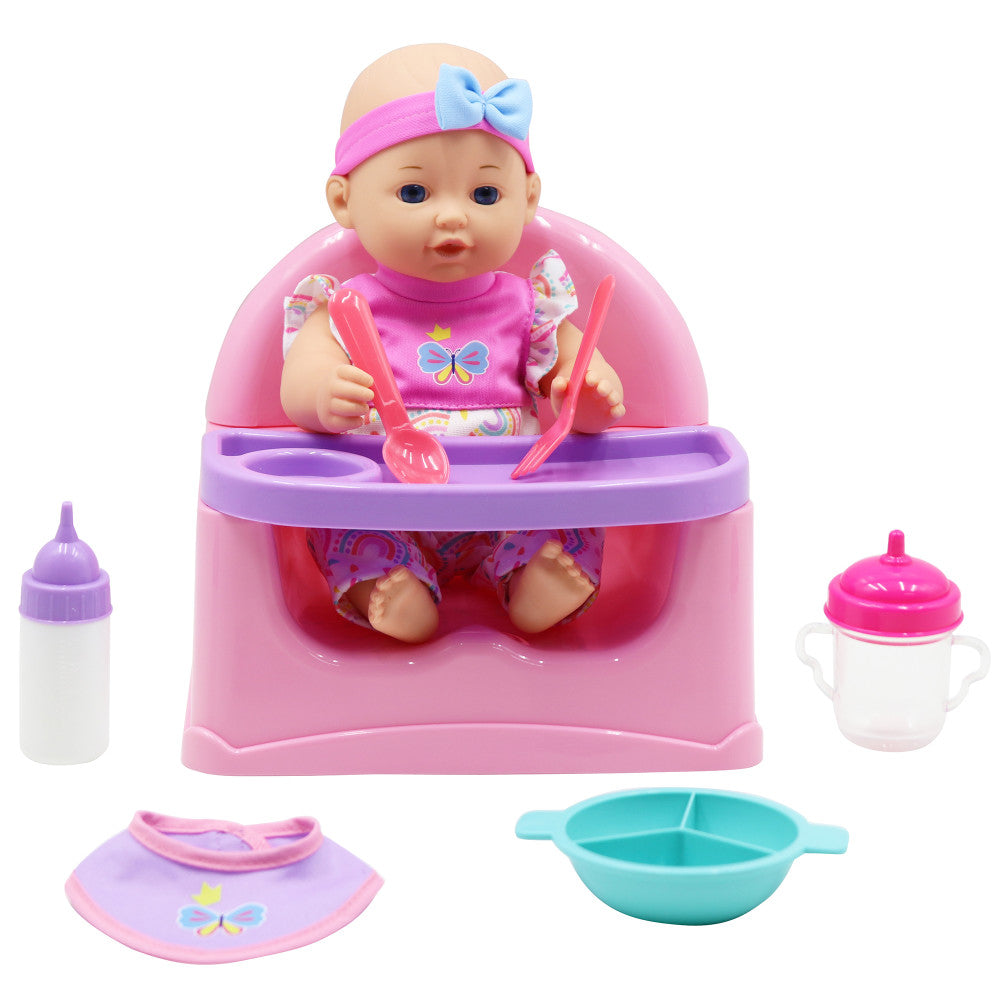 Baby doll with pink headband and butterfly shirt seated in pink high chair, holding pink utensils, with bottle, sippy cup, bib, and turquoise bowl accessories