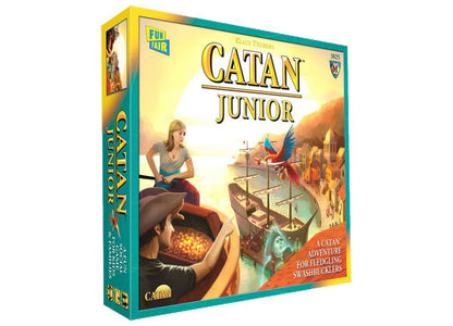 Catan Junior board game box featuring illustrated children playing a pirate-themed strategy game with ships and island settlements