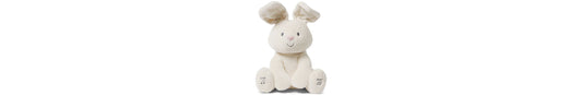 Cream-colored plush bunny with floppy ears, smiling face, and interactive buttons on its paws