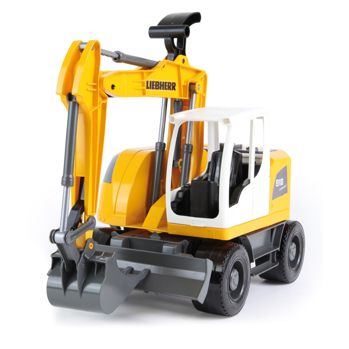 Yellow and white Liebherr A918 Litronic excavator toy with working bucket and cab, gray treaded base, on plain background