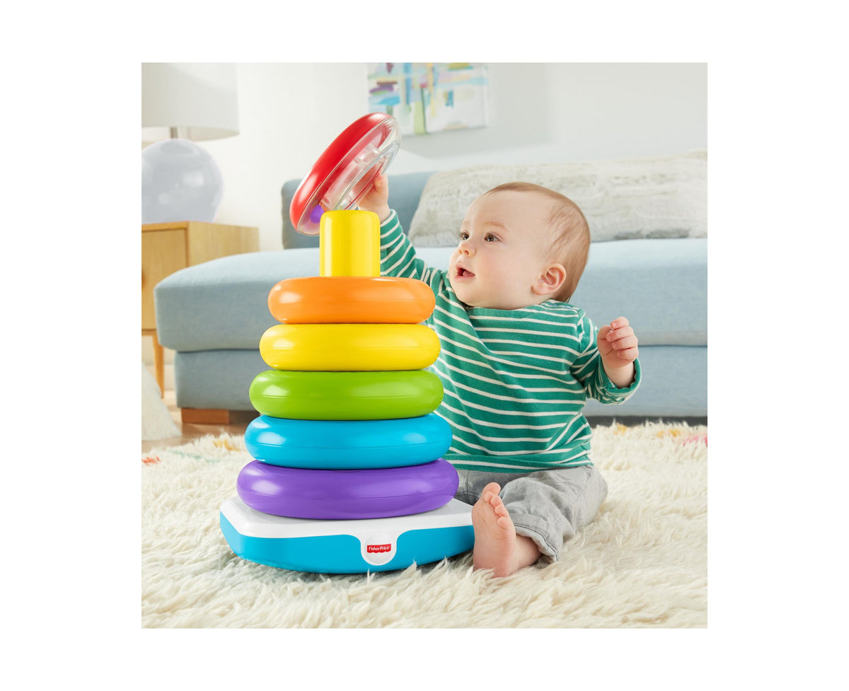 Fisher-Price Giant Rock-a-Stack colorful ring stacking toy with rainbow rings and rattle top, baby playing