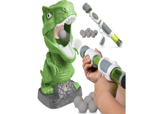 Green T-Rex dinosaur toy with open mouth holding gray foam balls, modeled by a child holding white and gray air launcher blaster with lime green accents and ext