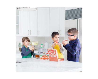 Melissa & Doug Top & Bake Wooden Pizza Counter Play Set with three children making pizzas at counter
