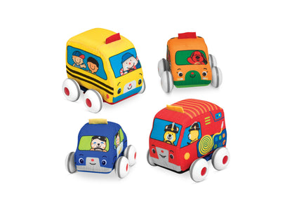 Four colorful soft fabric pull-back vehicles with wheels: yellow school bus, orange car, blue car, and red fire truck with character illustrations on windows