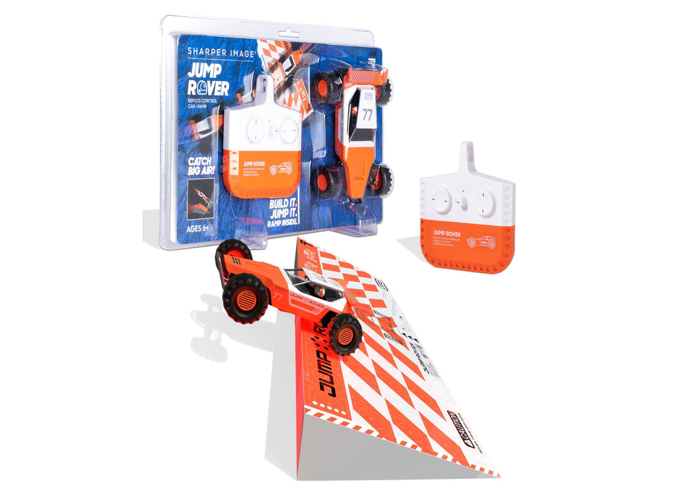 Jump Rover remote control car set with orange and white ramp, white controller, and packaging showing stunt vehicle and ramp components