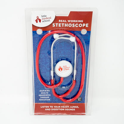 Little Medical School real working stethoscope with red tubing, white earpieces, and white diaphragm, displayed in clear plastic packaging