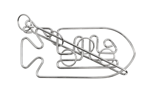 Silver metal wire puzzle shaped like a fish with interlocking loops and a sliding ring, shown on plain white background