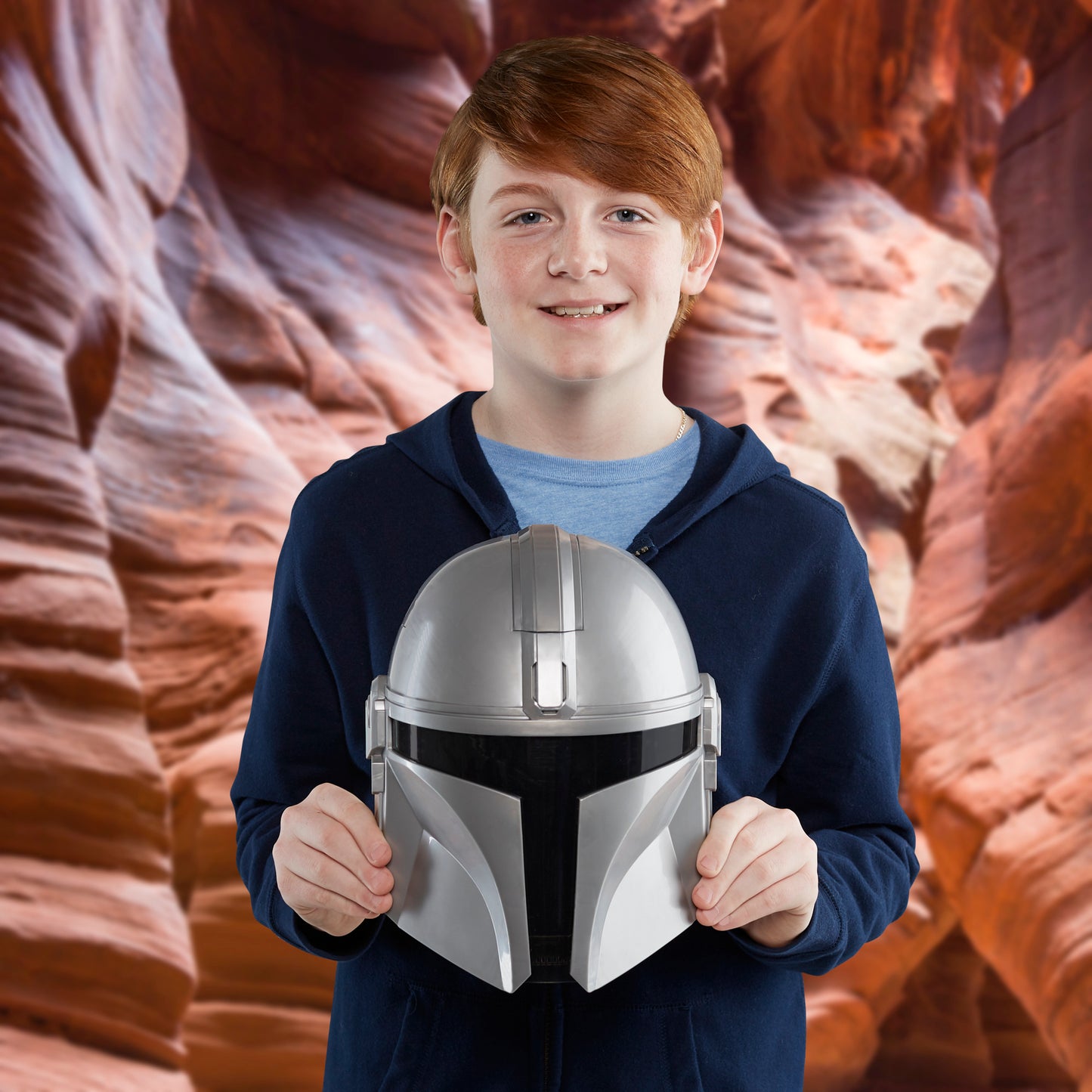 SW Mandalorian Feature Mask silver helmet toy held by smiling child