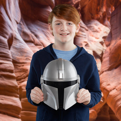 SW Mandalorian Feature Mask silver helmet toy held by smiling child