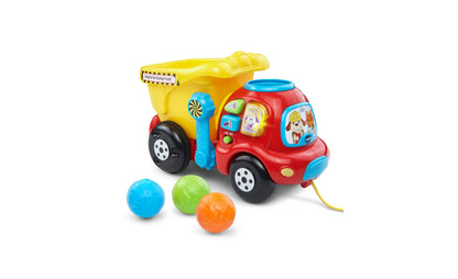 Red and yellow VTech Drop and Go Dump Truck with blue lever and interactive buttons, includes three colorful balls