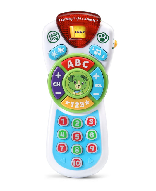 LeapFrog Learning Lights Remote with red light-up top, green wheel with puppy character, ABC and channel controls, and blue number pad with buttons 1-10