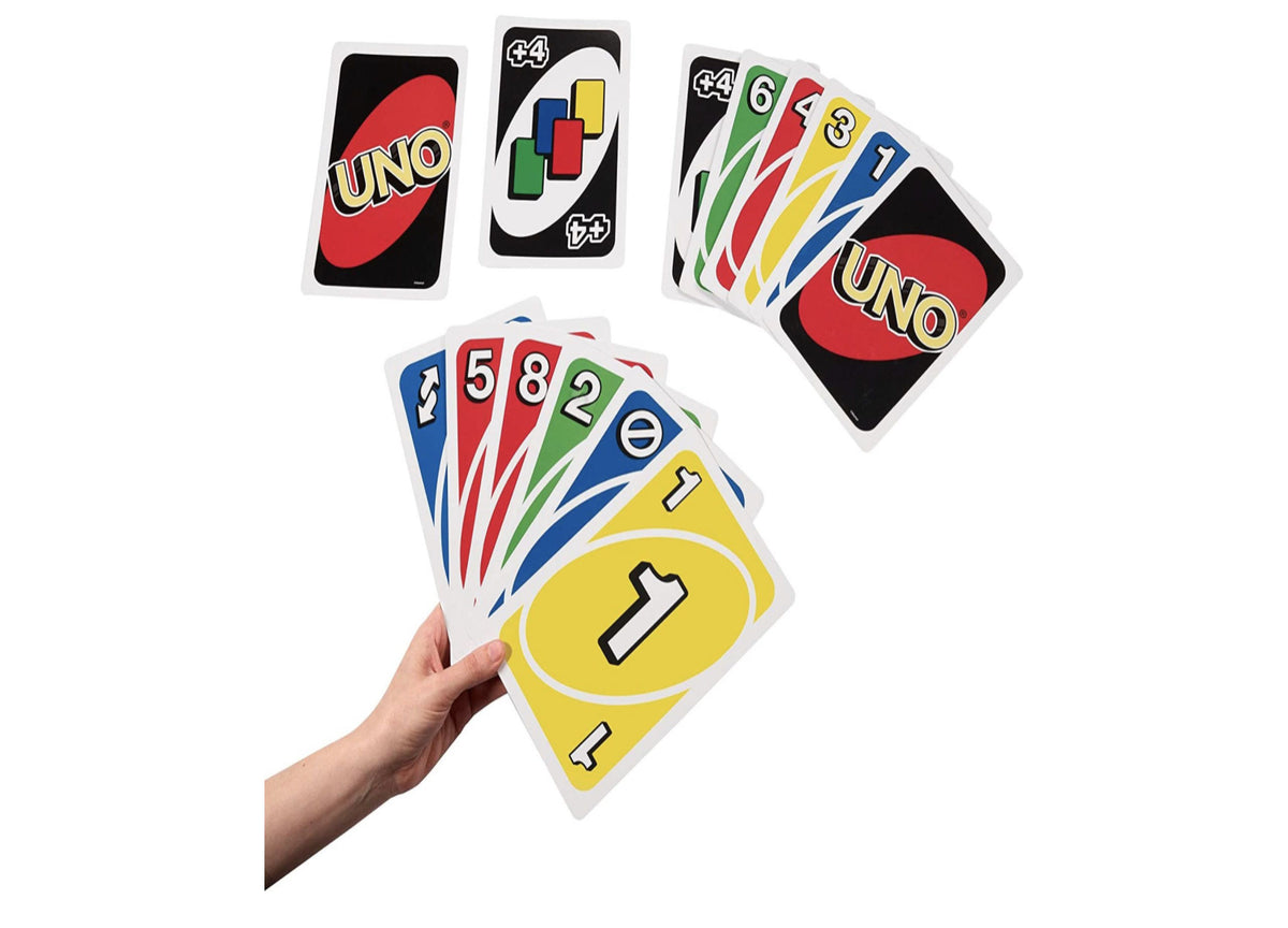 Giant UNO Card Game with oversized colored cards in blue, red, green, and yellow displayed in hand and fanned out