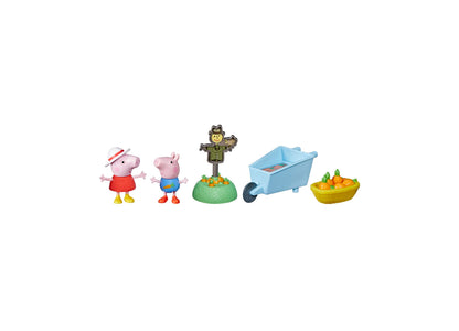 Peppa Pig Growing Garden Play Set with five pieces: pink pig figure wearing red dress and hat, blue-dressed pig figure, scarecrow on green base, blue wheelbarro