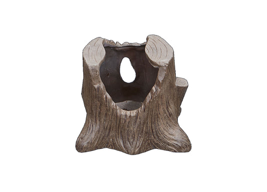 Large wooden tree stump with carved opening and two rounded ear-like knobs on top, brown weathered finish on plain background