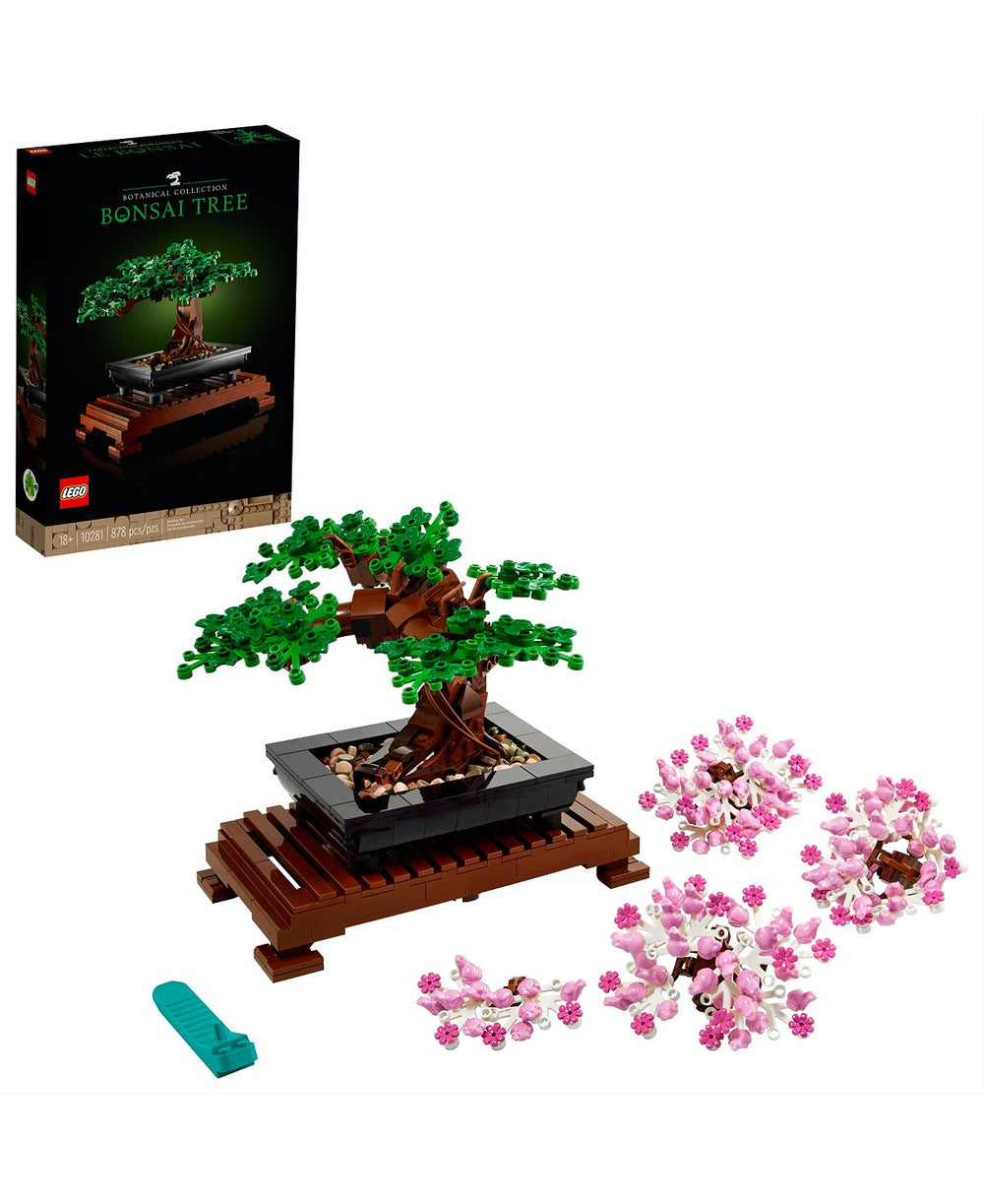 LEGO Bonsai Tree Botanical Collection building set with assembled green-leafed bonsai tree on wooden stand with black tray, displayed with pink and white flower