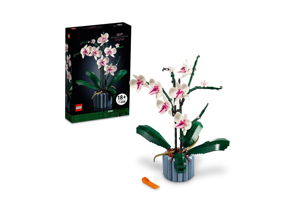 LEGO Icons Orchid Botanical Collection building set with assembled orchid plant in gray pot and pink-and-white flowers with green leaves, displayed next to blac