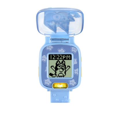 Blue VTech Bluey Wackadoo Watch with translucent top, star-patterned band, LCD screen displaying pixelated character and time 12:22 PM, yellow action button